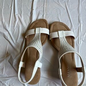 Alfani sandals size 7 1/2 with heel 1 1/2 and white with tan suede like sole.
